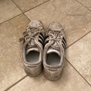 Well-worn Adidas ladies shoes